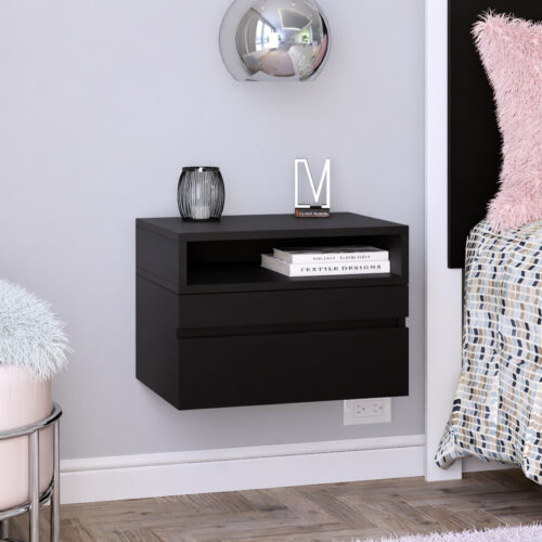 Mesa de luz flotante color negro con estante desayunador instalada en dormitorio